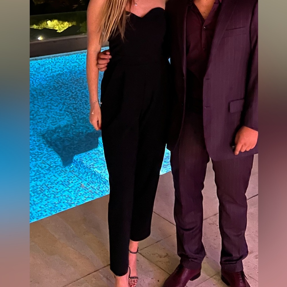 Black jumpsuit with pockets used once